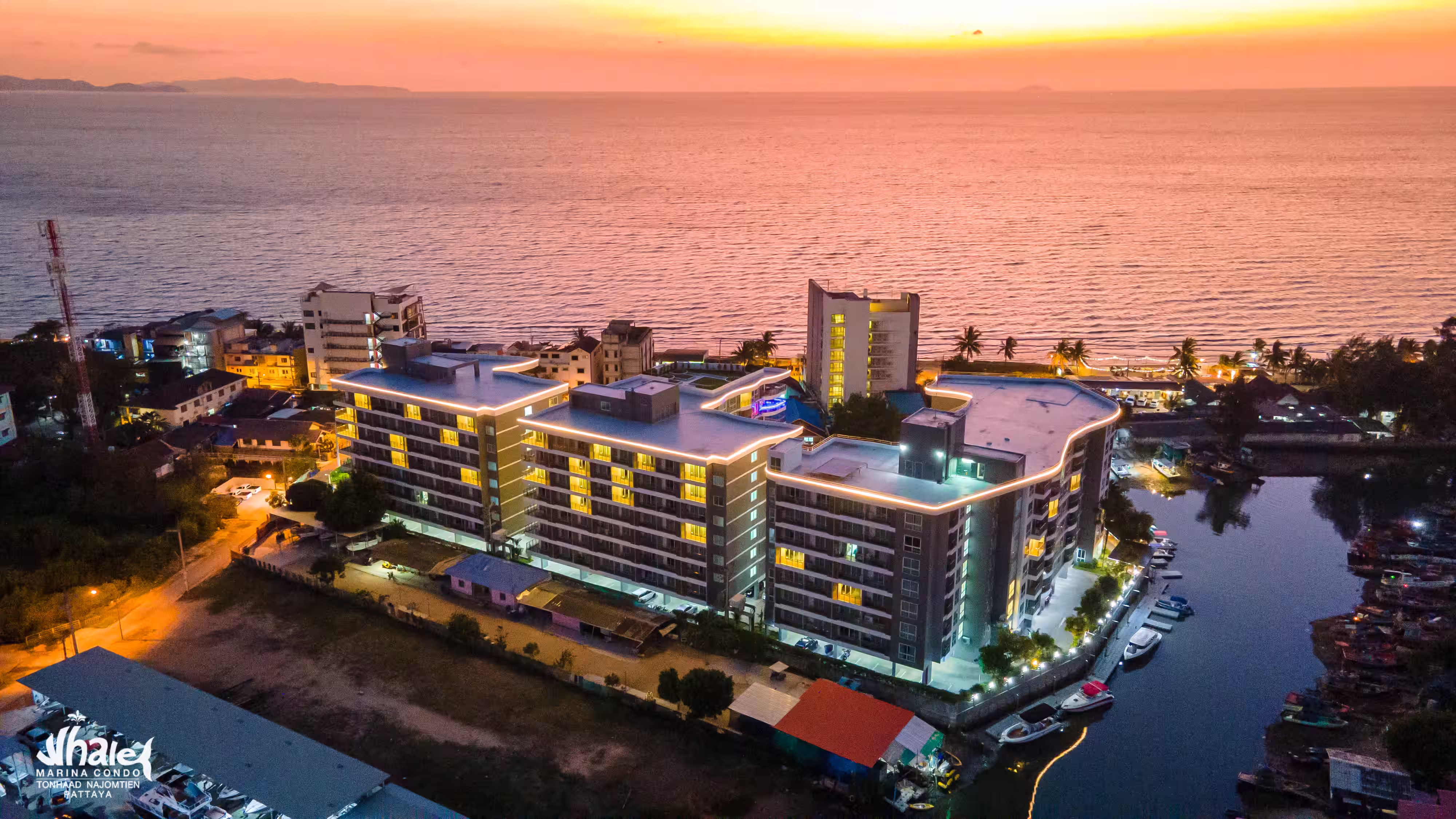 Whale Marina Condo's pool and green space