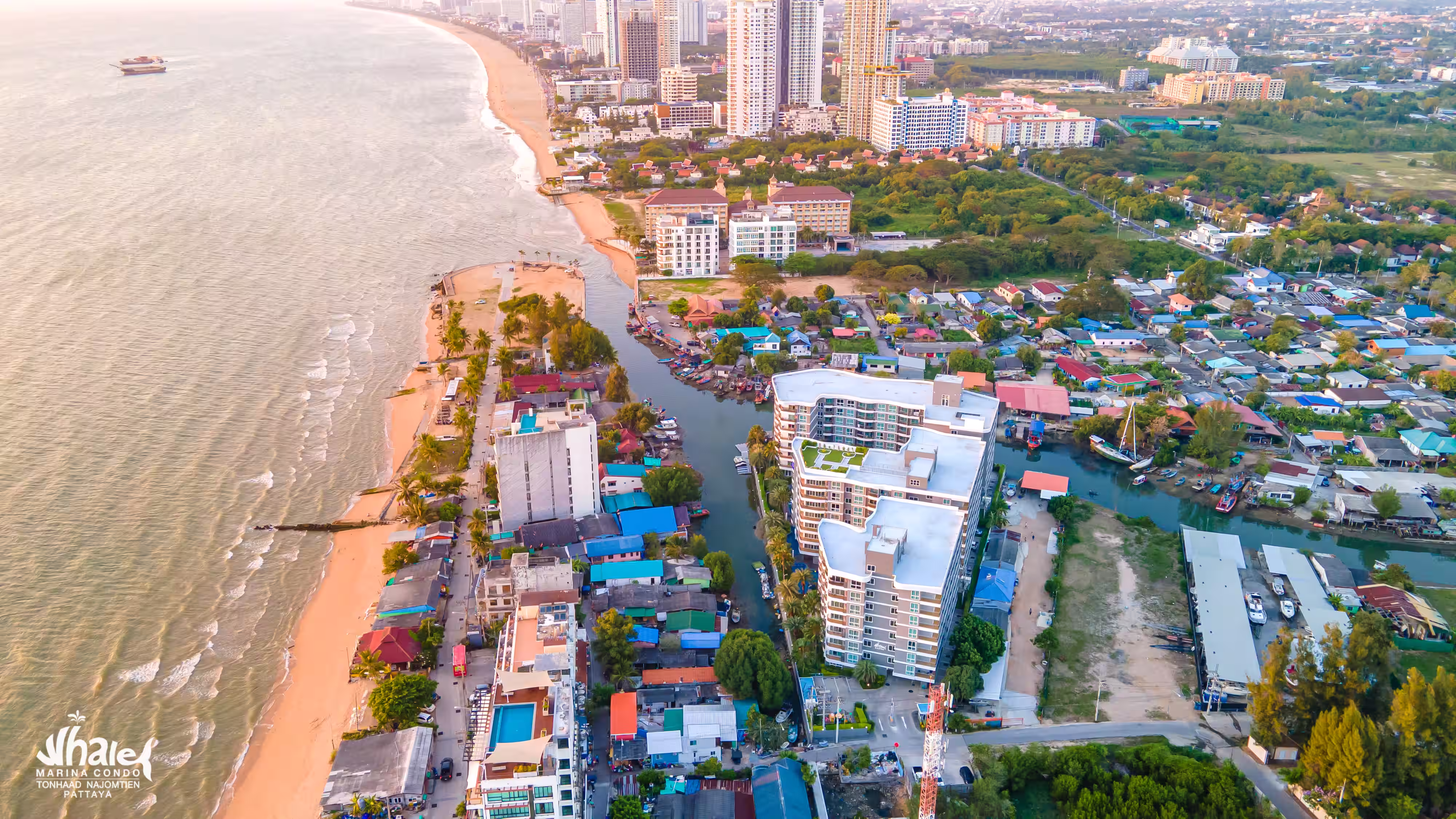 General view of Whale Marina Condo with pools and green areas