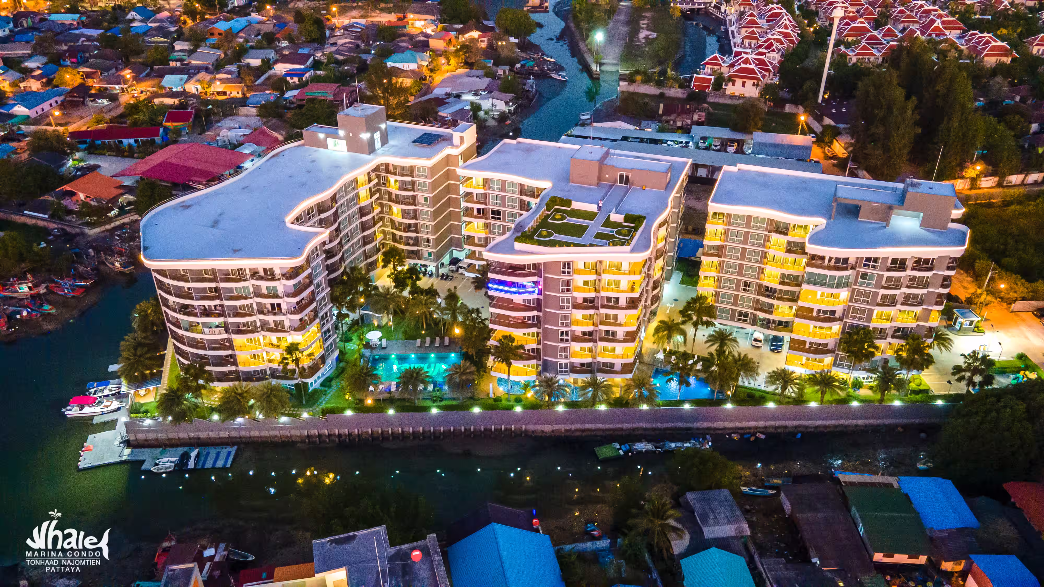 Whale Marina Condo with pool and green spaces
